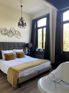 Postel nebo postele na pokoji v ubytování B in Antwerp + 37 fotografií