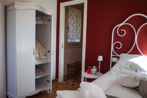 A bed or beds in a room at Audaces Resort