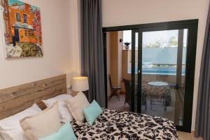 Postel nebo postele na pokoji v ubytování Casa Rosa Hacienda Del Alamo + 15 fotografií