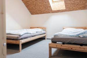 Postel nebo postele na pokoji v ubytování Party House Vratimov