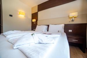 Postel nebo postele na pokoji v ubytování Best Western Hotel Adige