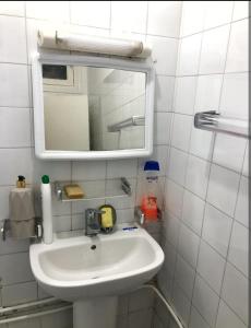 Koupelna v ubytování Apartment next to the beach + 8 fotografií