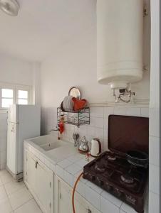 Kuchyň nebo kuchyňský kout v ubytování Apartment next to the beach