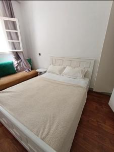 Postel nebo postele na pokoji v ubytování Apartment next to the beach