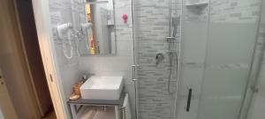 Koupelna v ubytování Titi Rooms