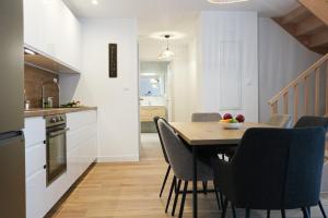 Kuchyň nebo kuchyňský kout v ubytování Duplex Échanges complices ,Frontière