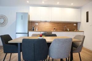 Kuchyň nebo kuchyňský kout v ubytování Duplex Échanges complices ,Frontière