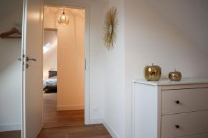 Postel nebo postele na pokoji v ubytování Duplex Échanges complices ,Frontière