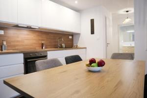 Kuchyň nebo kuchyňský kout v ubytování Duplex Échanges complices ,Frontière