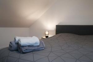 Postel nebo postele na pokoji v ubytování Duplex Échanges complices ,Frontière