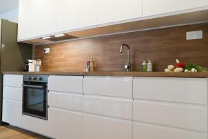 Kuchyň nebo kuchyňský kout v ubytování Duplex Échanges complices ,Frontière