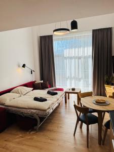 Postel nebo postele na pokoji v ubytování Apartments Relax Tále in Evergreen Resort