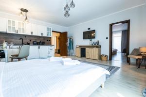 Et tv og/eller underholdning på Bella Mare Boutique apartment