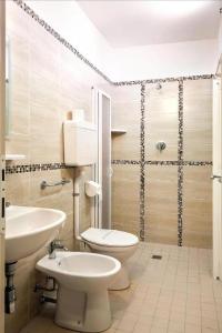 Koupelna v ubytování Hotel REX