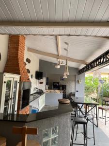 Køkken eller tekøkken på Casa dos fundos em condomínio + 37 billeder