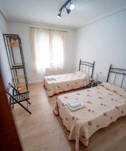A bed or beds in a room at AT SAN MIGUEL o