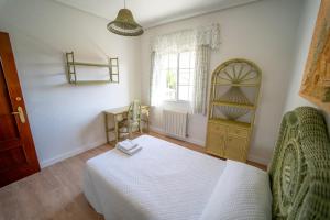 A bed or beds in a room at AT SAN MIGUEL o