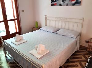 Postel nebo postele na pokoji v ubytování Residence Orsa Minore