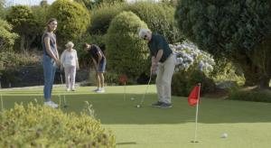 a group of people playing a game of golf at Bowood Park Hotel in Camelford