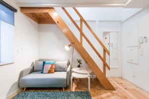 a living room with a couch and a table at GuestReady - Easygoing Pool to River in Bandeira