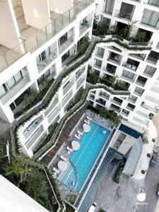 an overhead view of an apartment building with a swimming pool at Apec Mandala Sea View Comhomes Phú Yên in Tuy Hoa