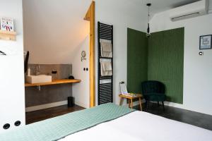 Postel nebo postele na pokoji v ubytování Boetiekhotel Villa Wanrooy