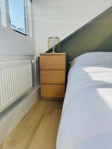 Postel nebo postele na pokoji v ubytování BeachHouse Oranje Nassau