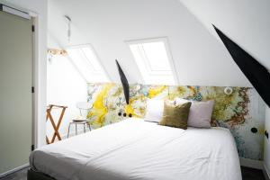 Postel nebo postele na pokoji v ubytování Boetiekhotel Villa Wanrooy