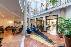 Posezení v ubytování HOTEL HACIENDA SANTA BARBARA