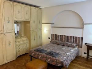 Postel nebo postele na pokoji v ubytování Al Portico Private Rooms