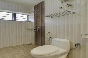 Een badkamer bij Hotel Xec Residency
