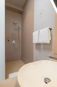Ванна кімната в Boulderbar Hotel Leonding