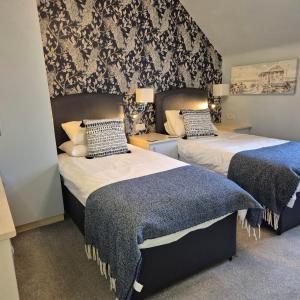 Postel nebo postele na pokoji v ubytování Kintrae B&B