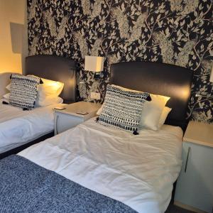 Postel nebo postele na pokoji v ubytování Kintrae B&B