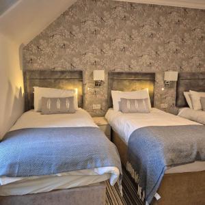 Postel nebo postele na pokoji v ubytování Kintrae B&B
