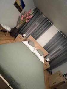 a bedroom with a bed with at Olymp Hotel in Magdeburg
