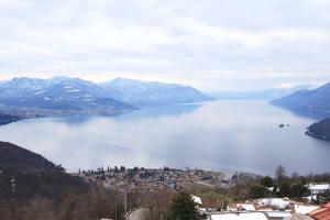 a view of a large body of water with mountains at Apartment Mediterraneo - 120 in Musignano