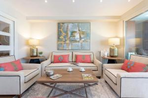 Et opholdsområde på Genteel Home Paseo de la Victoria