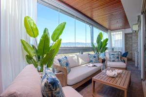 Et opholdsområde på Genteel Home Paseo de la Victoria