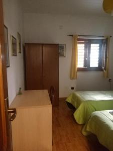 Postel nebo postele na pokoji v ubytování rita