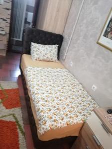 Postel nebo postele na pokoji v ubytování Apartmani Studio