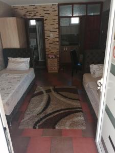 Postel nebo postele na pokoji v ubytování Apartmani Studio