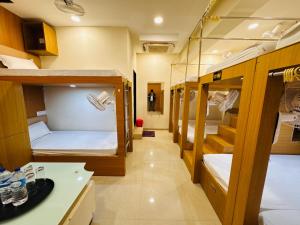 Hotel Shivlok客房内的一张或多张床位
