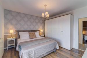 Posteľ alebo postele v izbe v ubytovaní Apartment Franko