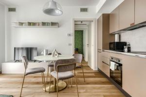 Η κουζίνα ή μικρή κουζίνα στο Limehome Milan Park Towers