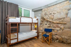 Postel nebo postele na pokoji v ubytování Olá Vida - Hostel Caminha