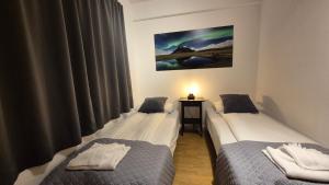 Voodi või voodid majutusasutuse Kirkjufell Hotel by Snæfellsnes Peninsula West Iceland - Grundarfjordur toas