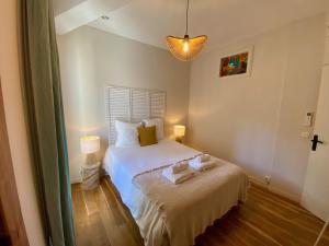 Posteľ alebo postele v izbe v ubytovaní ''Rooftop'' Superbe T3 quartier haut avec Rooftop privé!