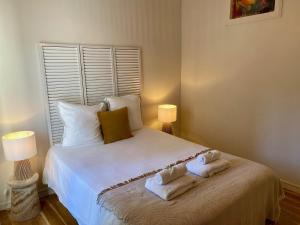 Posteľ alebo postele v izbe v ubytovaní ''Rooftop'' Superbe T3 quartier haut avec Rooftop privé!