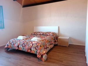 Postel nebo postele na pokoji v ubytování Vigna di pettineo - guest house